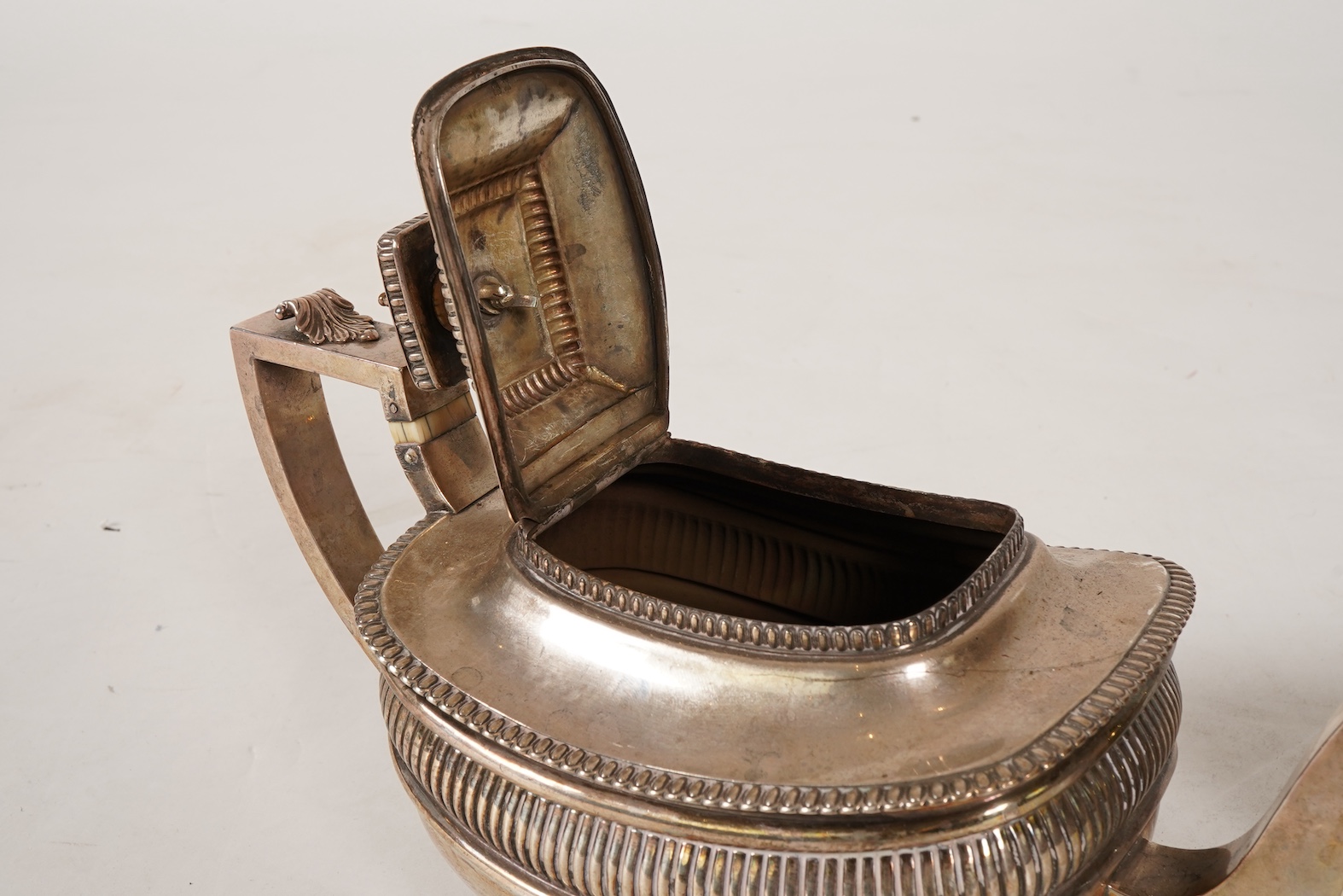 A George III silver three piece tea set, by John Wakefield